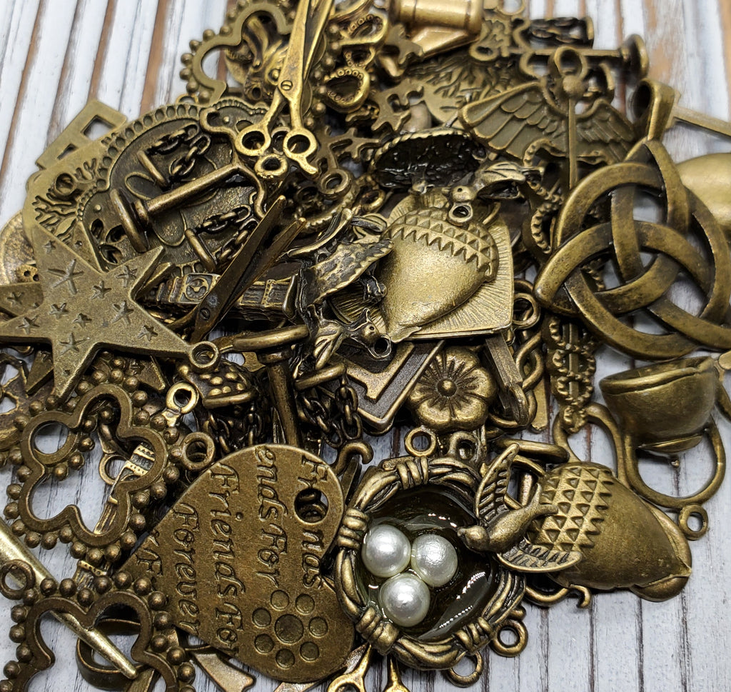 Bulk Charms 1/4lb Antique Bronze Assorted Charms - L1032 – Glamour Girl  Beads